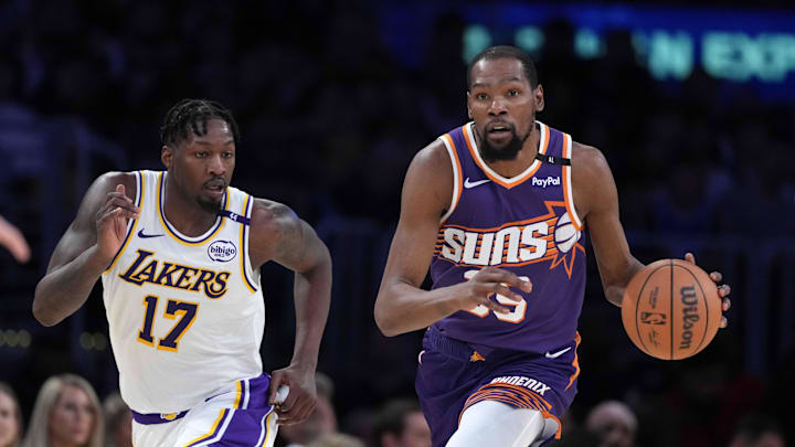 Mar 16, 2025; Los Angeles, California, USA; Phoenix Suns forward Kevin Durant (35) dribbles the ball against Los Angeles Lakers forward Dorian Finney-Smith (17) in the second half at Crypto.com Arena. Mandatory Credit: Kirby Lee-Imagn Images Mar 16, 2025; Los Angeles, California, USA; Phoenix Suns forward Kevin Durant (35) dribbles the ball against Los Angeles Lakers forward Dorian Finney-Smith (17) in the second half at Crypto.com Arena. Mandatory Credit: Kirby Lee-Imagn Images