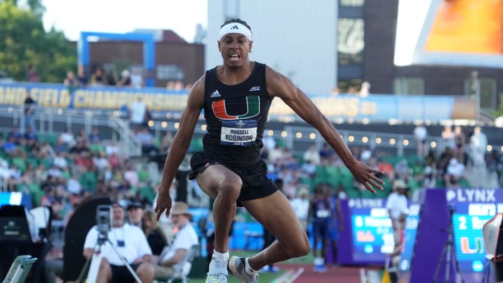 Jun 7, 2024; Eugene, OR, USA; Russell Robinson of Miami places second in the triple jump at 56-2 1/2 (17.13m) during the NCAA Track and Field Championships at Hayward Field. Mandatory Credit: Kirby Lee-USA TODAY Sports Jun 7, 2024; Eugene, OR, USA; Russell Robinson of Miami places second in the triple jump at 56-2 1/2 (17.13m) during the NCAA Track and Field Championships at Hayward Field. Mandatory Credit: Kirby Lee-USA TODAY Sports