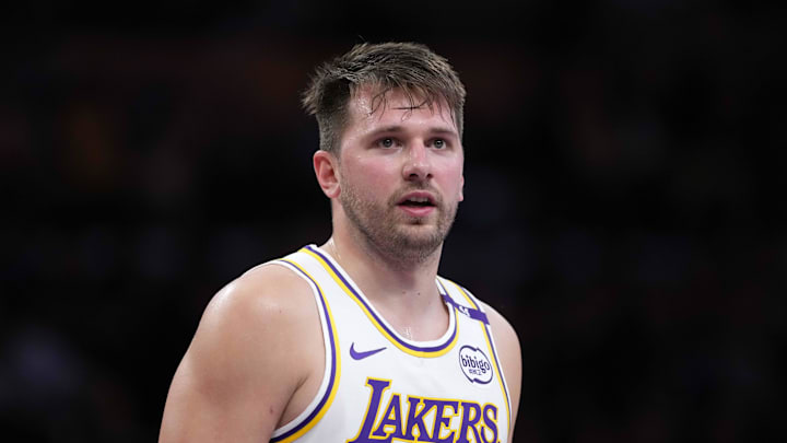 Mar 16, 2025; Los Angeles, California, USA; Los Angeles Lakers guard Luka Doncic (77) reacts against the Phoenix Suns in the second half at Crypto.com Arena. Mandatory Credit: Kirby Lee-Imagn Images