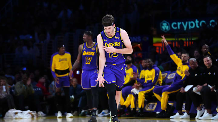 Mar 17, 2025; Los Angeles, California, USA; Los Angeles Lakers guard Austin Reaves (15) reacts after a three-point basket in the second half against the San Antonio Spurs at the Crypto.com Arena. Mandatory Credit: Kirby Lee-Imagn Images Mar 17, 2025; Los Angeles, California, USA; Los Angeles Lakers guard Austin Reaves (15) reacts after a three-point basket in the second half against the San Antonio Spurs at the Crypto.com Arena. Mandatory Credit: Kirby Lee-Imagn Images