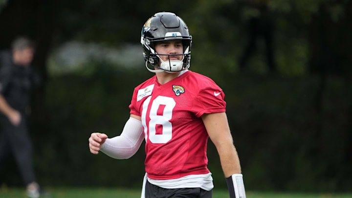 Oct 16, 2024; Watford, United Kingdom; Jacksonville Jaguars quarterback John Rhys Plumlee (18) during practice at The Grove. Mandatory Credit: Kirby Lee-Imagn Images Oct 16, 2024; Watford, United Kingdom; Jacksonville Jaguars quarterback John Rhys Plumlee (18) during practice at The Grove. Mandatory Credit: Kirby Lee-Imagn Images