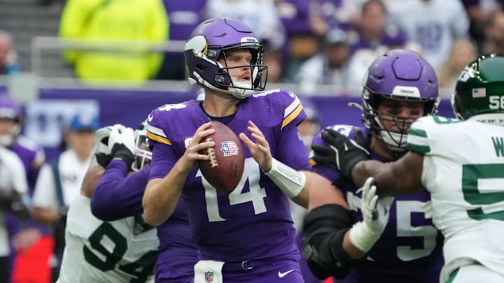 Oct 6, 2024; London, United Kingdom; Minnesota Vikings quarterback Sam Darnold (14) throws the ball against the New York Jets in the first half at Tottenham Hotspur Stadium. Mandatory Credit: Kirby Lee-Imagn Images