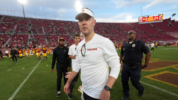Nov 30, 2024; Los Angeles, California, USA; Southern California Trojans head coach Lincoln Riley leaves the field after the game against the Notre Dame Fighting Irish at United Airlines Field at Los Angeles Memorial Coliseum. Mandatory Credit: Kirby Lee-Imagn Images