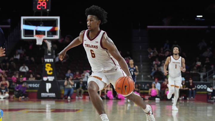 Feb 11, 2025; Los Angeles, California, USA; Southern California Trojans guard Wesley Yates III (6) dribbles the ball against the Penn State Nittany Lions in the second half at Galen Center. Mandatory Credit: Kirby Lee-Imagn Images