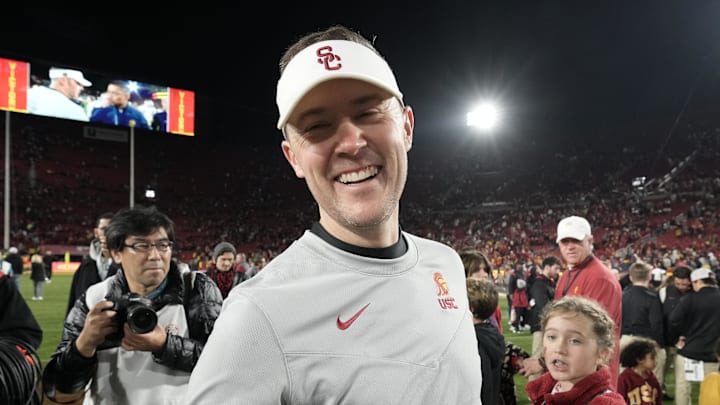 Nov 26, 2022; Los Angeles, California, USA; Southern California Trojans head coach Lincoln Riley celebrates after the game against the Notre Dame Fighting Irish at United Airlines Field at Los Angeles Memorial Coliseum. Mandatory Credit: Kirby Lee-Imagn Images