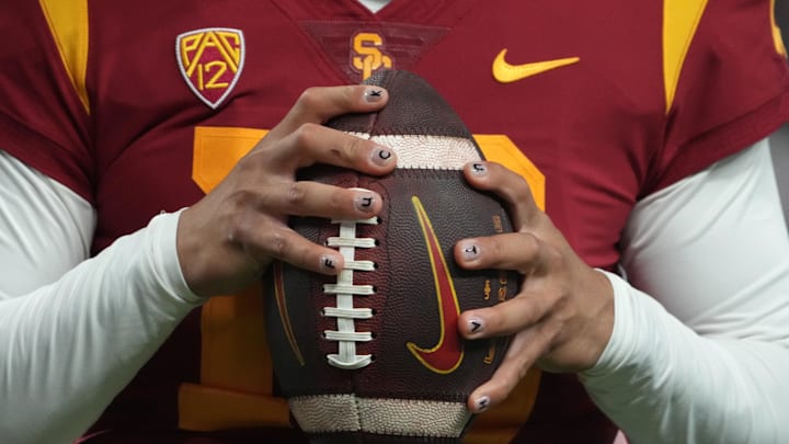 The fingernails of Southern California Trojans quarterback Caleb Williams during the Pac-12 Championship in 2022. The fingernails of Southern California Trojans quarterback Caleb Williams during the Pac-12 Championship in 2022.