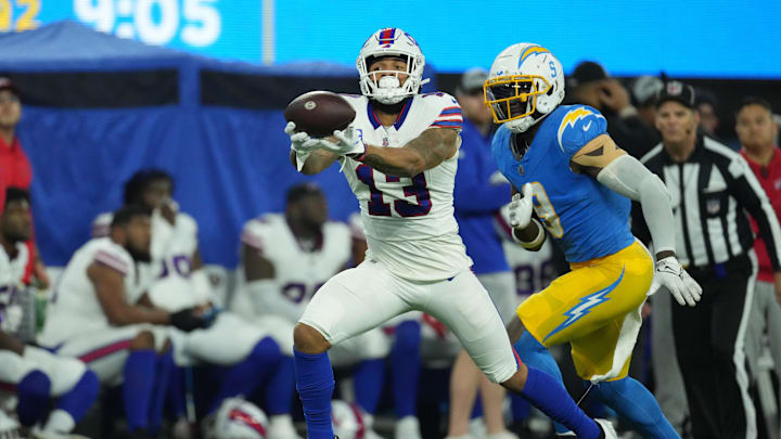 Dec 23, 2023; Inglewood, California, USA; Buffalo Bills wide receiver Gabe Davis (13) catches a 57-yard touchdown pass against the Los Angeles Chargers in the first half at SoFi Stadium Dec 23, 2023; Inglewood, California, USA; Buffalo Bills wide receiver Gabe Davis (13) catches a 57-yard touchdown pass against the Los Angeles Chargers in the first half at SoFi Stadium