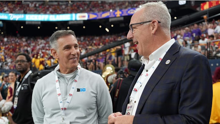 Big Ten commissioner Tony Petitti (left) and SEC commissioner Greg Sankey 