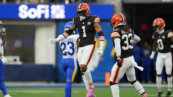 Dec 3, 2023; Inglewood, California, USA; Cleveland Browns safety Juan Thornhill (1) and safety Ronnie Hickman (33) celebrate against the Los Angeles Rams in the first half at SoFi Stadium. Mandatory Credit: Kirby Lee-Imagn Images