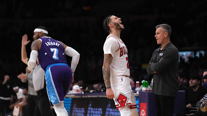 Nov 15, 2021; Los Angeles, California, USA; Chicago Bulls guard Lonzo Ball (2) celebrates after a 3-point basket as coach Billy Donovan (right) and Los Angeles Lakers forward Carmelo Anthony (7) watch in the second half at Staples Center. The Bulls defeated the Lakers 121-103. Mandatory Credit: Kirby Lee-Imagn Images Nov 15, 2021; Los Angeles, California, USA; Chicago Bulls guard Lonzo Ball (2) celebrates after a 3-point basket as coach Billy Donovan (right) and Los Angeles Lakers forward Carmelo Anthony (7) watch in the second half at Staples Center. The Bulls defeated the Lakers 121-103. Mandatory Credit: Kirby Lee-Imagn Images