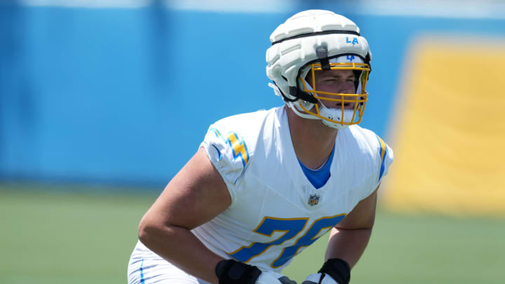May 29, 2024; Costa Mesa, CA, USA; Los Angeles Chargers offensive tackle Joe Alt (76) wears a Guardian helmet cap during organized team activities at Hoag Performance Center. Mandatory Credit: Kirby Lee-USA TODAY Sports