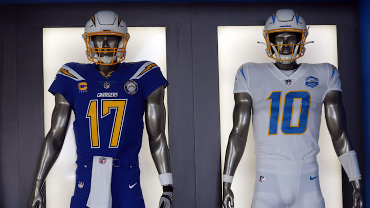 The uniforms and helmets of Chargers quarterbacks Philip Rivers and Justin Herbert at the Los Angeles Chargers headquarters and practice facility at The Bolt. 