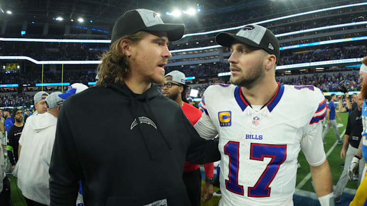 Los Angeles Chargers quarterback Justin Herbert shakes hands with Buffalo Bills quarterback Josh Allen. Kirby Lee-Imagn Images