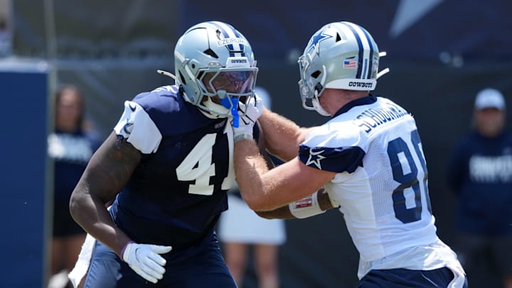 Dallas Cowboys defensive end Donovan Ezeiruaku and tight end Luke Schoonmaker at training camp at the River Ridge Fields. 
