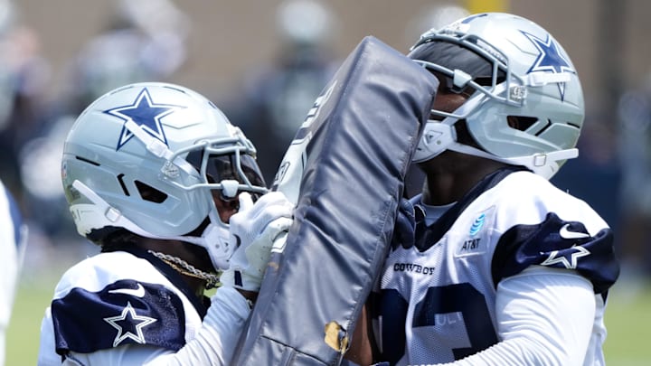 Dallas Cowboys running backs Miles Sanders and Javonte Williams participate in blocking drills during training camp 