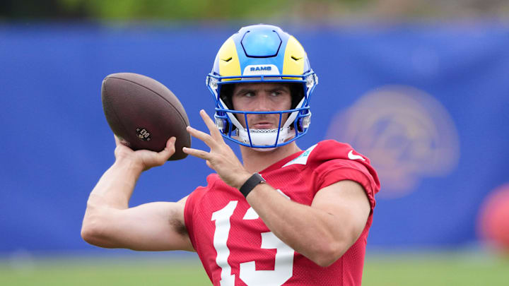 May 28, 2025; Woodland Hills, CA, USA; Los Angeles Rams quarterback Stetson Bennett (13) throws the ball during organized team activities at Rams Practice Facility. Mandatory Credit: Kirby Lee-Imagn Images