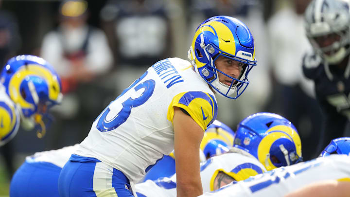 Aug 9, 2025; Inglewood, California, USA; Los Angeles Rams quarterback Stetson Bennett IV (13) takes the snap against the Dallas Cowboys in the first half at SoFi Stadium. Mandatory Credit: Kirby Lee-Imagn Images