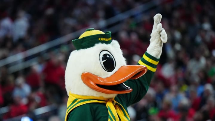 Mar 15, 2024; Las Vegas, NV, USA; The Oregon Ducks mascot gestures during the game against the Arizona Wildcats at T-Mobile Arena. Mandatory Credit: Kirby Lee-USA TODAY Sports Mar 15, 2024; Las Vegas, NV, USA; The Oregon Ducks mascot gestures during the game against the Arizona Wildcats at T-Mobile Arena. Mandatory Credit: Kirby Lee-USA TODAY Sports