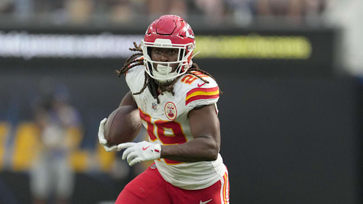 Sep 29, 2024; Inglewood, California, USA; Kansas City Chiefs running back Kareem Hunt (29) carries the ball against the Los Angeles Chargers in the second half at SoFi Stadium