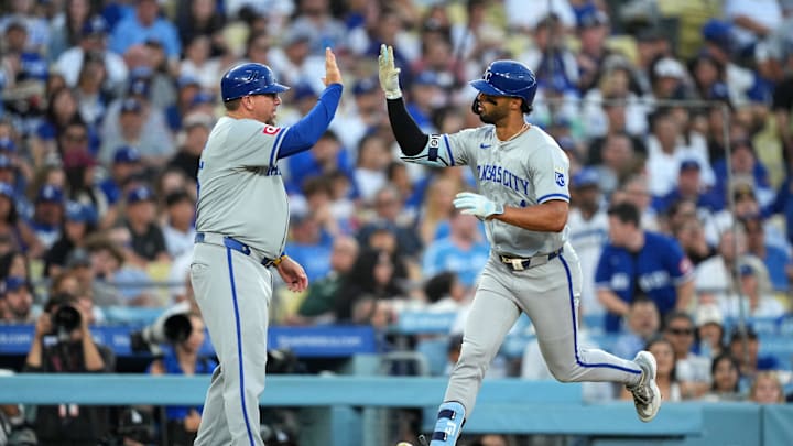 Kansas City Royals left fielder MJ Melendez (1) celebrates with major league field coordinator, third base coach Vance Wilson after hitting a grand slam home run in the sixth inning against the Los Angeles Dodgers at Dodger Stadium on June 15. Kansas City Royals left fielder MJ Melendez (1) celebrates with major league field coordinator, third base coach Vance Wilson after hitting a grand slam home run in the sixth inning against the Los Angeles Dodgers at Dodger Stadium on June 15.