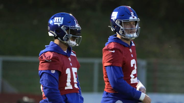 Nov 8, 2024; Munich, Germany; New York Giants quarterbacks Drew Lock (2) and Tommy DeVito (15) during practice at the FC Bayern Munchen training grounds at Sabener Strasse.   