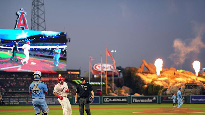 Aug 14, 2024; Anaheim, California, USA; Los Angeles Angels catcher Matt Thaiss (21) crosses home plate after hitting a solo home run in the sixth inning against Toronto Blue Jays starting pitcher Jose Berrios (17) at Angel Stadium. Mandatory Credit: Kirby Lee-Imagn Images