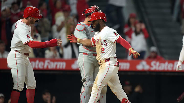 Apr 30, 2024; Anaheim, California, USA; Los Angeles Angels third baseman Luis Rengifo (2) celebrates with left fielder Taylor Ward (3) after hitting a three-run home run in the sixth inning against the Philadelphia Phillies at Angel Stadium. Mandatory Credit: Kirby Lee-Imagn Images