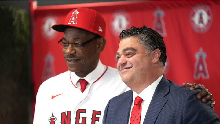 Nov 15, 2023; Anaheim, CA, USA; Los Angeles Angels manager Ron Washington (left) poses with general manager Perry Minasian at introductory press conference at Angel Stadium of Anaheim. Mandatory Credit: Kirby Lee-Imagn Images