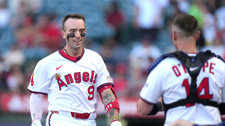 Jul 11, 2025; Anaheim, California, USA; Los Angeles Angels shortstop Zach Neto (9) is greeted by catcher Logan O'Hoppe (14) after hitting a home run in the first inning Arizona Diamondbacks at Angel Stadium. Mandatory Credit: Kirby Lee-Imagn Images