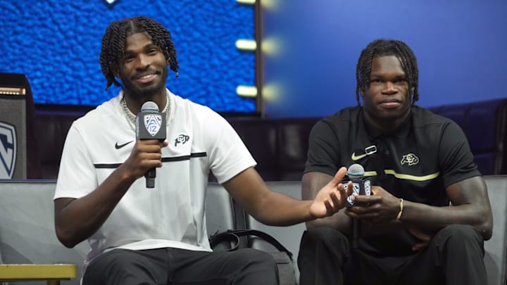 Jul 21, 2023; Las Vegas, NV, USA; Colorado Buffaloes quarterback Shadeur Sanders (left) and receiver Travis Hunter during Pac-12 Media Day at Resorts World Las Vegas. Mandatory Credit: Kirby Lee-Imagn Images