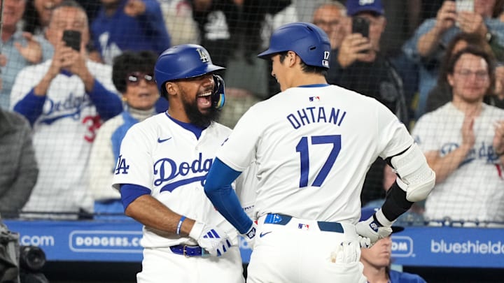 Sep 20, 2024; Los Angeles, California, USA; Los Angeles Dodgers designated hitter Shohei Ohtani (17) celebrates with left fielder Teoscar Hernandez (37) after hitting a two-run home run in the fifth inning against the Colorado Rockies at Dodger Stadium. Mandatory Credit: Kirby Lee-Imagn Images