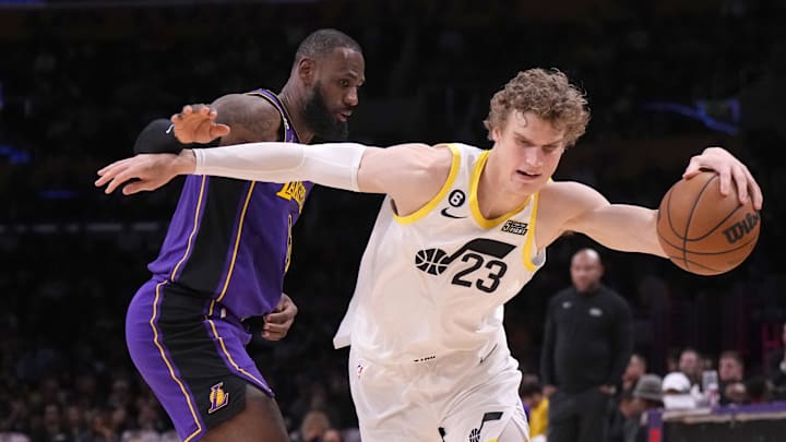 Nov 4, 2022; Los Angeles, California, USA; Utah Jazz forward Lauri Markkanen (23) dribbles the ball against Los Angeles Lakers forward LeBron James (6) in the second half at Crypto.com Arena. Mandatory Credit: Kirby Lee-Imagn Images Nov 4, 2022; Los Angeles, California, USA; Utah Jazz forward Lauri Markkanen (23) dribbles the ball against Los Angeles Lakers forward LeBron James (6) in the second half at Crypto.com Arena. Mandatory Credit: Kirby Lee-Imagn Images
