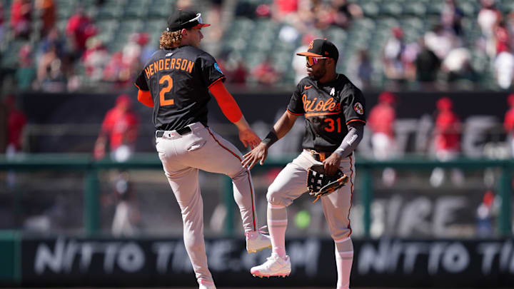 May 11, 2025; Anaheim, California, USA; Baltimore Orioles shortstop Gunnar Henderson (2) and center fielder Cedric Mullins (31) celebrate after the game against the Los Angeles Angels  at Angel Stadium.