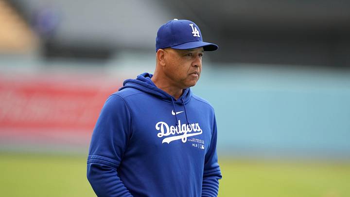 Apr 12, 2024; Los Angeles, California, USA; Los Angeles Dodgers manager Dave Roberts reacts during the game against the San Diego Padres at Dodger Stadium. Mandatory Credit: Kirby Lee-Imagn Images
