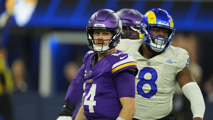 Oct 24, 2024; Inglewood, California, USA; Minnesota Vikings quarterback Sam Darnold (14) reacts against the Los Angeles Rams in the first half at SoFi Stadium. Mandatory Credit: Kirby Lee-Imagn Images