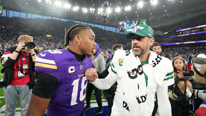 Oct 6, 2024; London, United Kingdom; New York Jets quarterback Aaron Rodgers (8) talks with Minnesota Vikings wide receiver Justin Jefferson (18) after the game at Tottenham Hotspur Stadium. Mandatory Credit: Kirby Lee-Imagn Images Oct 6, 2024; London, United Kingdom; New York Jets quarterback Aaron Rodgers (8) talks with Minnesota Vikings wide receiver Justin Jefferson (18) after the game at Tottenham Hotspur Stadium. Mandatory Credit: Kirby Lee-Imagn Images