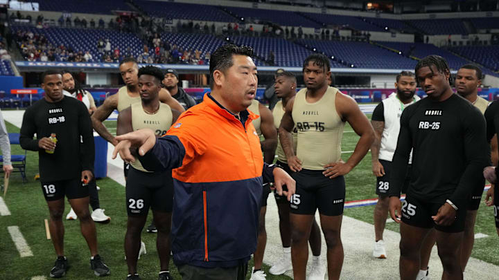 Mar 2, 2024; Indianapolis, IN, USA; Denver Broncos Western National area scout Sae Woon Jo talks with Washington running back Dillon Johnson (RB15) and Purdue running back Tyrone Tracy Jr (RB25) during the 2024 NFL Scouting Combine at Lucas Oil Stadium. Mandatory Credit: Kirby Lee-Imagn Images Mar 2, 2024; Indianapolis, IN, USA; Denver Broncos Western National area scout Sae Woon Jo talks with Washington running back Dillon Johnson (RB15) and Purdue running back Tyrone Tracy Jr (RB25) during the 2024 NFL Scouting Combine at Lucas Oil Stadium. Mandatory Credit: Kirby Lee-Imagn Images