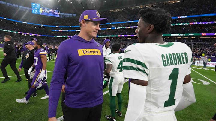 Oct 6, 2024; London, United Kingdom; Minnesota Vikings coach Kevin O'Connell (left) talks with New York Jets cornerback Sauce Gardner (1) after the game at Tottenham Hotspur Stadium. Mandatory Credit: Kirby Lee-Imagn Images