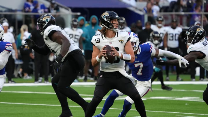 Oct 8, 2023; London United Kingdom; Jacksonville Jaguars quarterback Trevor Lawrence (16) throws the ball against the Buffalo Bills in the second half of an NFL International Series game at Tottenham Hotspur Stadium. Mandatory Credit: Kirby Lee-USA TODAY Sports