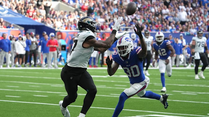 Oct 8, 2023; London United Kingdom, Jacksonville Jaguars tight end Evan Engram (17) attempts to catch the ball against Buffalo Bills cornerback Dane Jackson (30) during the first half of an NFL International Series game at Tottenham Hotspur Stadium. Mandatory Credit: Kirby Lee-Imagn Images