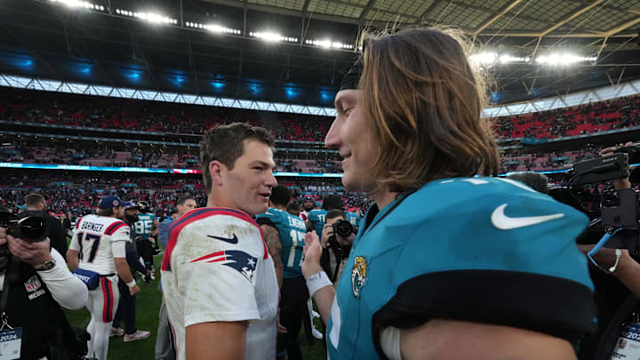 Oct 20, 2024; London, United Kingdom; New England Patriots quarterback Drake Maye (10) and Jacksonville Jaguars quarterback Trevor Lawrence (16) shake hands after an NFL International Series game at Wembley Stadium. Mandatory Credit: Kirby Lee-Imagn Images