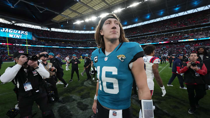 Oct 20, 2024; London, United Kingdom; Jacksonville Jaguars quarterback Trevor Lawrence (16) reacts after an NFL International Series game against the New England Patriots at Wembley Stadium. Mandatory Credit: Kirby Lee-Imagn Images