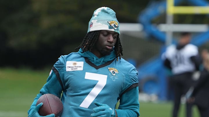 Oct 12, 2024; Watford, United Kingdom; Jacksonville Jaguars wide receiver Brian Thomas Jr. (7) carries the ball during practice at The Grove. Mandatory Credit: Kirby Lee-Imagn Images
