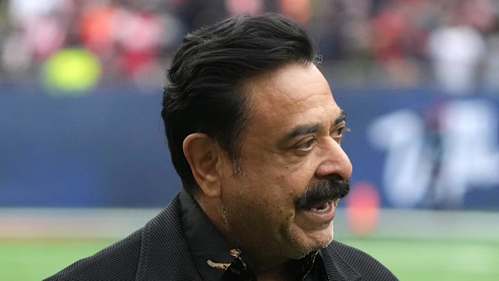 Oct 13, 2024; London, United Kingdom; Jacksonville Jaguars owner Shad Khan reacts during an NFL International Series game against the Chicago Bears at Tottenham Hotspur Stadium. Mandatory Credit: Kirby Lee-Imagn Images
