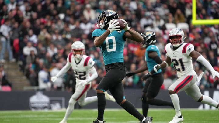 Oct 20, 2024; London, United Kingdom; Jacksonville Jaguars wide receiver Gabe Davis (0) catches the ball against the New England Patriots in the first half of an NFL International Series game at Wembley Stadium. Mandatory Credit: Kirby Lee-Imagn Images