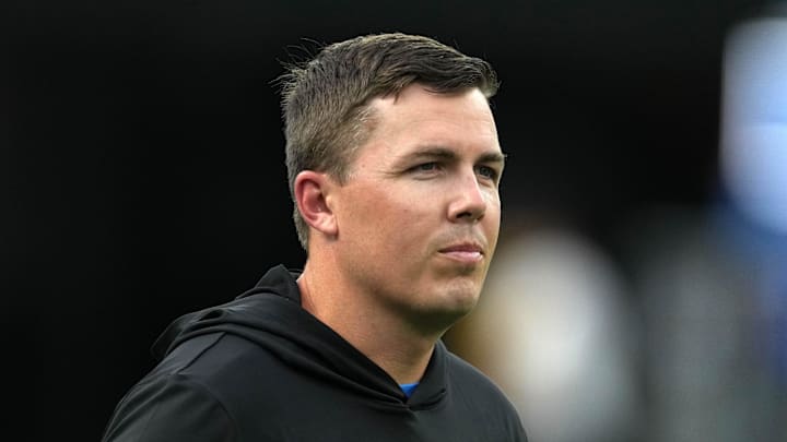 Aug 12, 2023; Inglewood, California, USA;  Los Angeles Chargers offensive coordinator Kellen Moore watches during the game against the Los Angeles Rams at SoFi Stadium. Mandatory Credit: Kirby Lee-Imagn Images