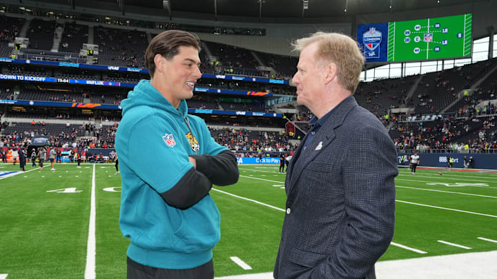Oct 13, 2024; London, United Kingdom; NFL commissioner Roger Goodell (right) talks with Jacksonville Jaguars wide receiver Louis Rees-Zammit during an NFL International Series game at Tottenham Hotspur Stadium. Mandatory Credit: Kirby Lee-Imagn Images