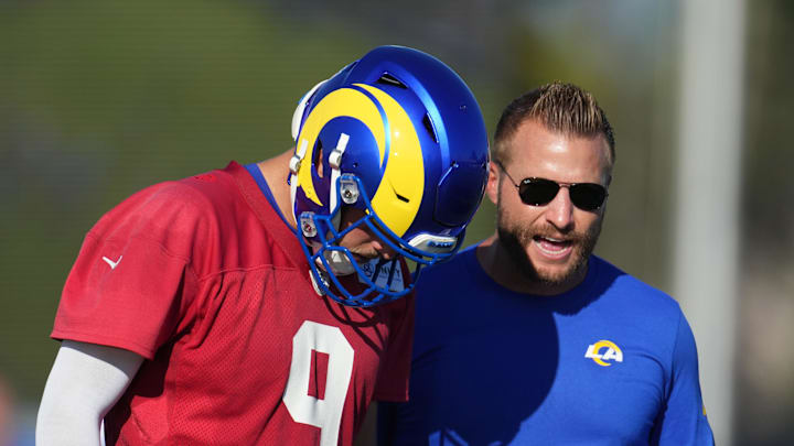 Jul 26, 2023; Irvine, CA, USA; Los Angeles Rams coach Sean McVay (right) talks with quarterback Matthew Stafford (9) during training camp at UC Irvine. Mandatory Credit: Kirby Lee-Imagn Images Jul 26, 2023; Irvine, CA, USA; Los Angeles Rams coach Sean McVay (right) talks with quarterback Matthew Stafford (9) during training camp at UC Irvine. Mandatory Credit: Kirby Lee-Imagn Images