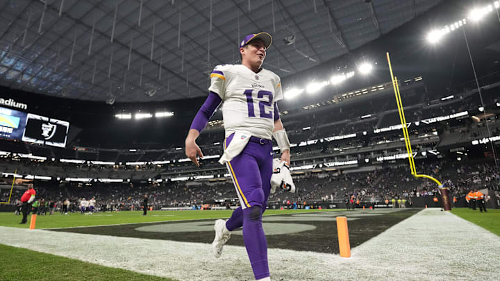 Dec 10, 2023; Paradise, Nevada, USA; Minnesota Vikings quarterback Nick Mullens (12) celebrates after the game against the Las Vegas Raiders at Allegiant Stadium. Mandatory Credit: Kirby Lee-Imagn Images