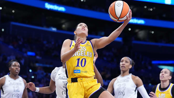 Jul 29, 2025; Los Angeles, California, USA; LA Sparks guard Kelsey Plum (10) shoots the ball against the Las Vegas Aces in the first half at Crypto.com Arena. Mandatory Credit: Kirby Lee-Imagn Images